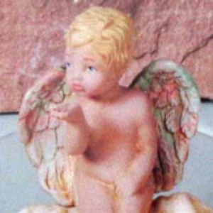 Cherub Blowing Kiss