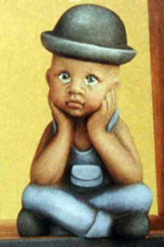 Boy Sitting With Hat