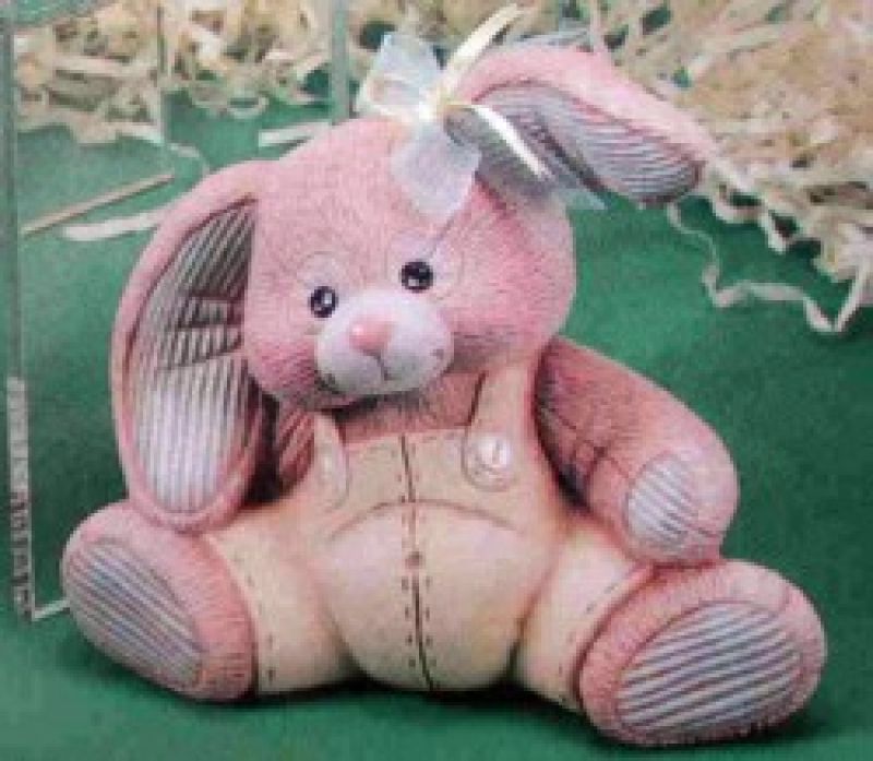 Small Stuffed Bunny Leaning Forward