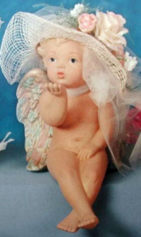 Cherub Blowing Kiss