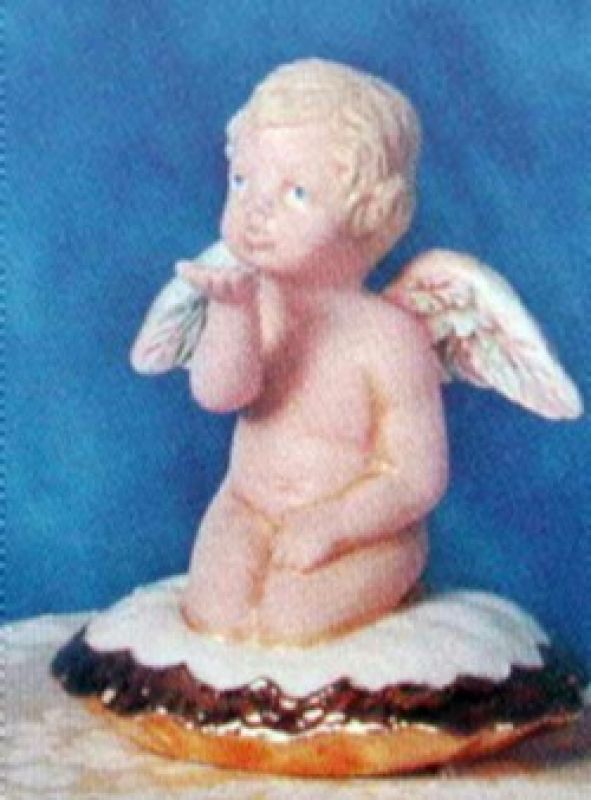 Cherub Blowing Kiss