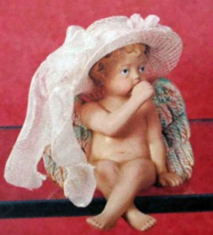 Cherub Sucking Thumb