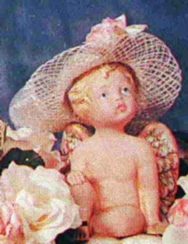 Cherub Sitting With Knees